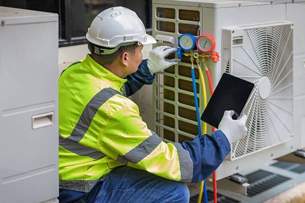 Professional Air Duct Cleaning technician working in Tewksbury, MA
